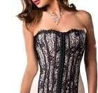 Woman wearing a strapless black sequin dress with a fitted silhouette