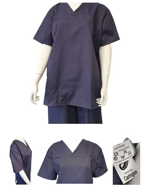 Navy blue short-sleeved tunic top displayed on mannequin with close-up details of sleeve, neckline, and care tag